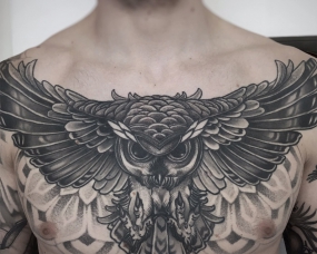 neo traditional owl chest tattoo